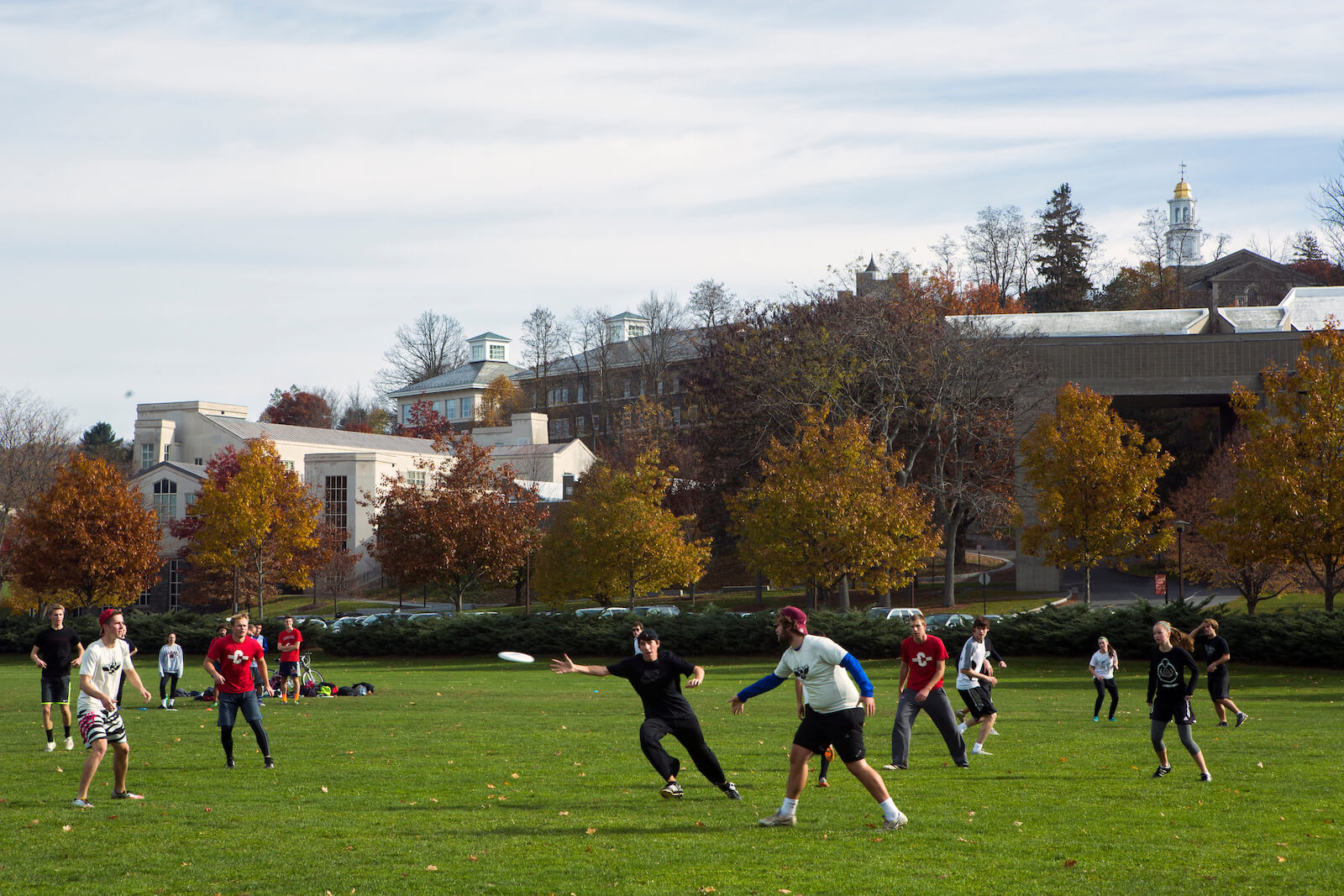 Members of the Ultimate Frisbee club play a game of pickup on Whitnall Field.