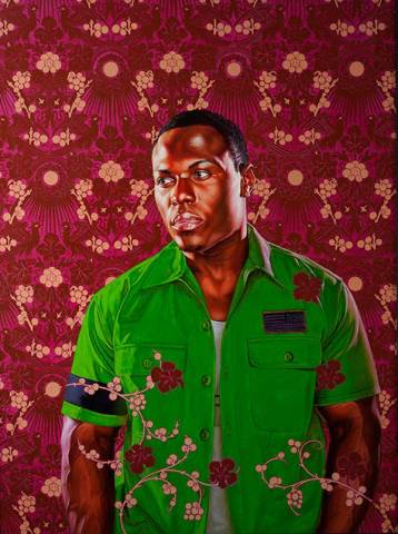 Portrait of black man in front of paisley background