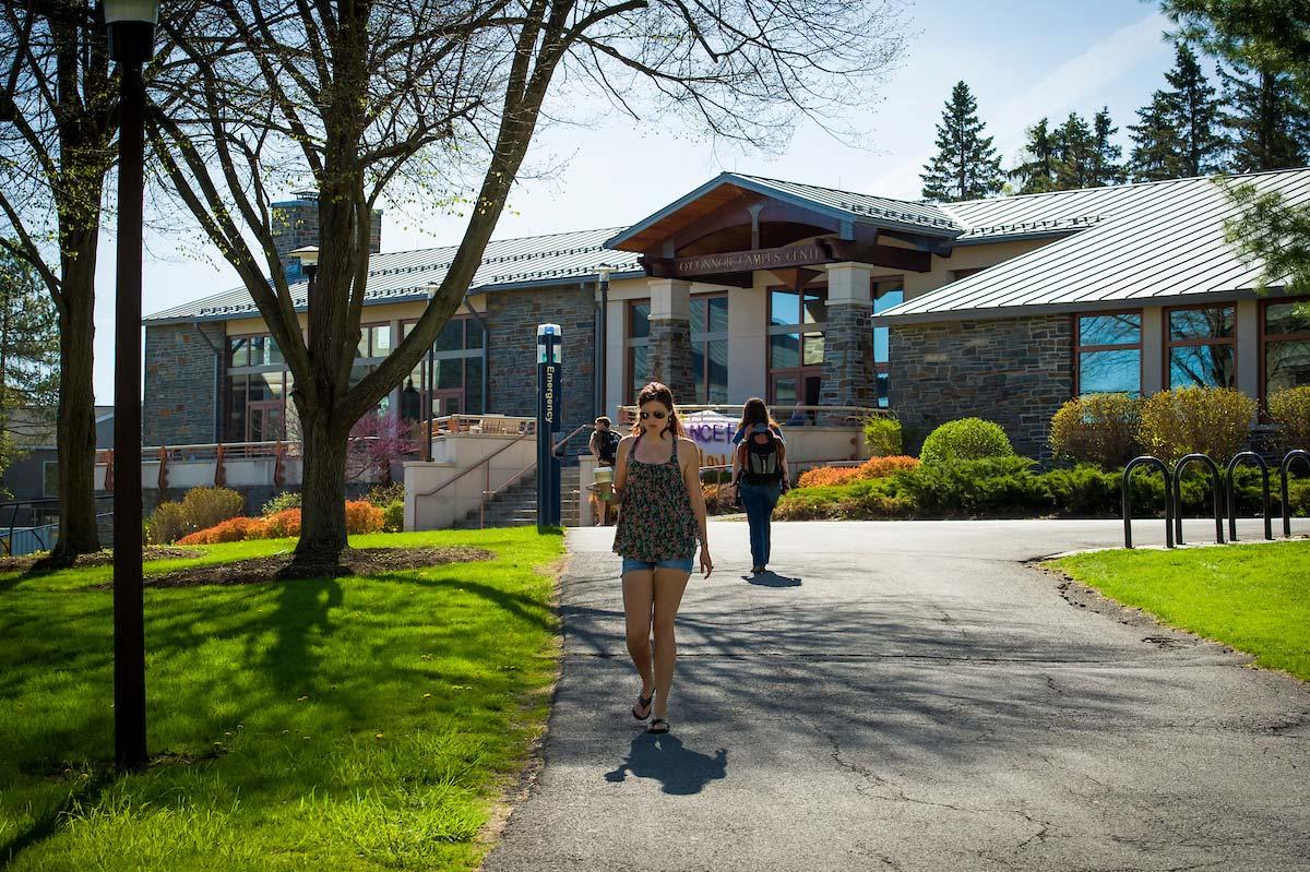 Colgate students walking in front of the O’Connor Campus Center.		