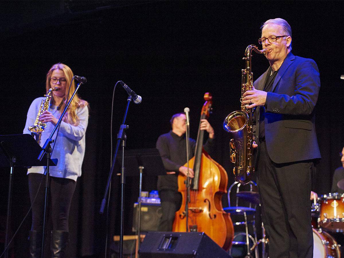 Musicians play jazz on stage at the Palace Theater