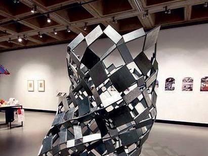 DeWitt Godfrey metal sculpture in gallery