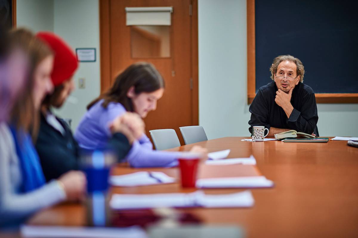 Professor Peter Balakian speaks with one of his classes in 2017.