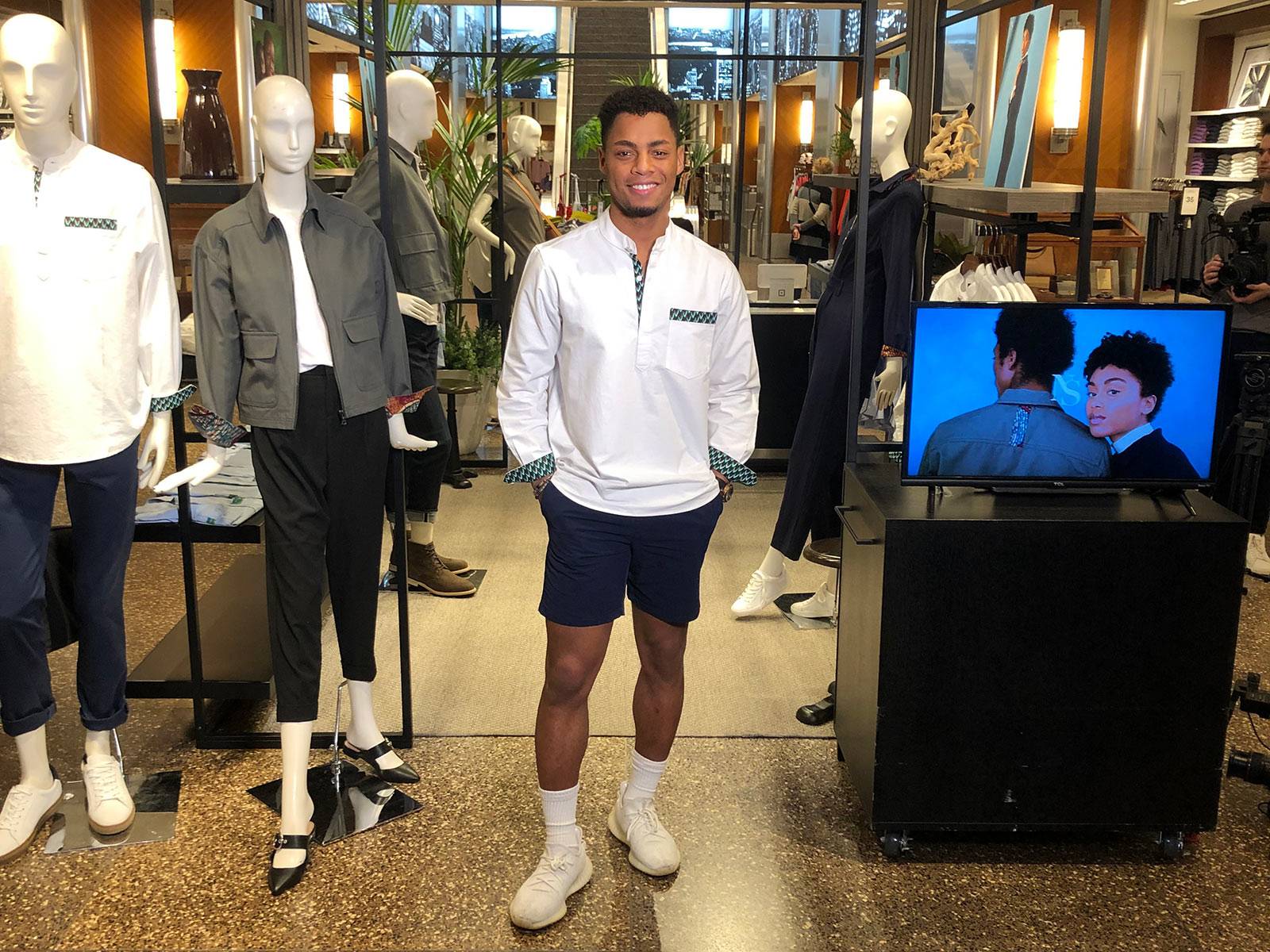Uyi Omorogbe stands in Banana Republic store