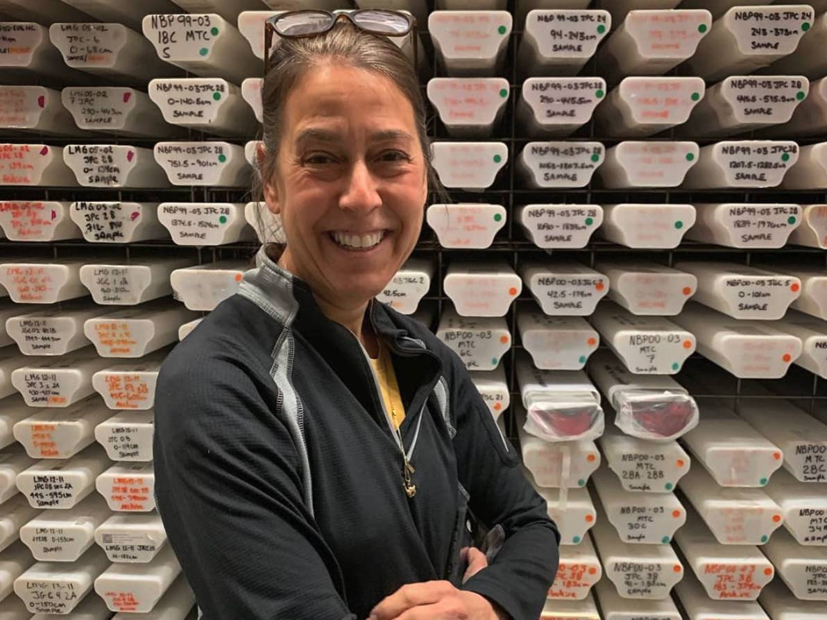 Prof. Amy Leventer stands in front of ice core samples