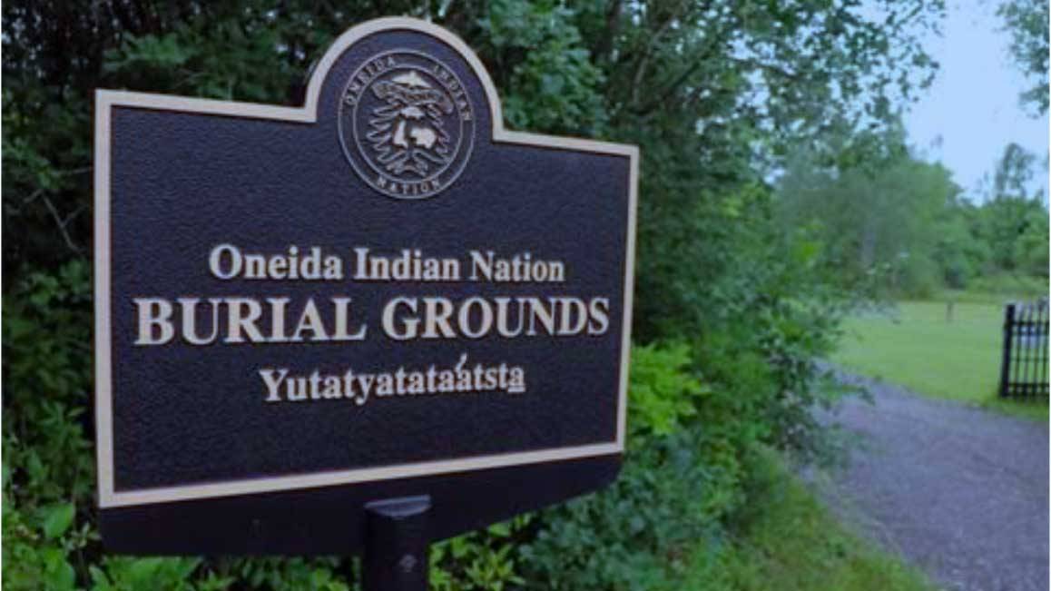 A sign outside of the Oneida Indian Nation burial grounds