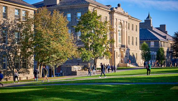 Students walk along the Colgate Academic Quad during the fall.