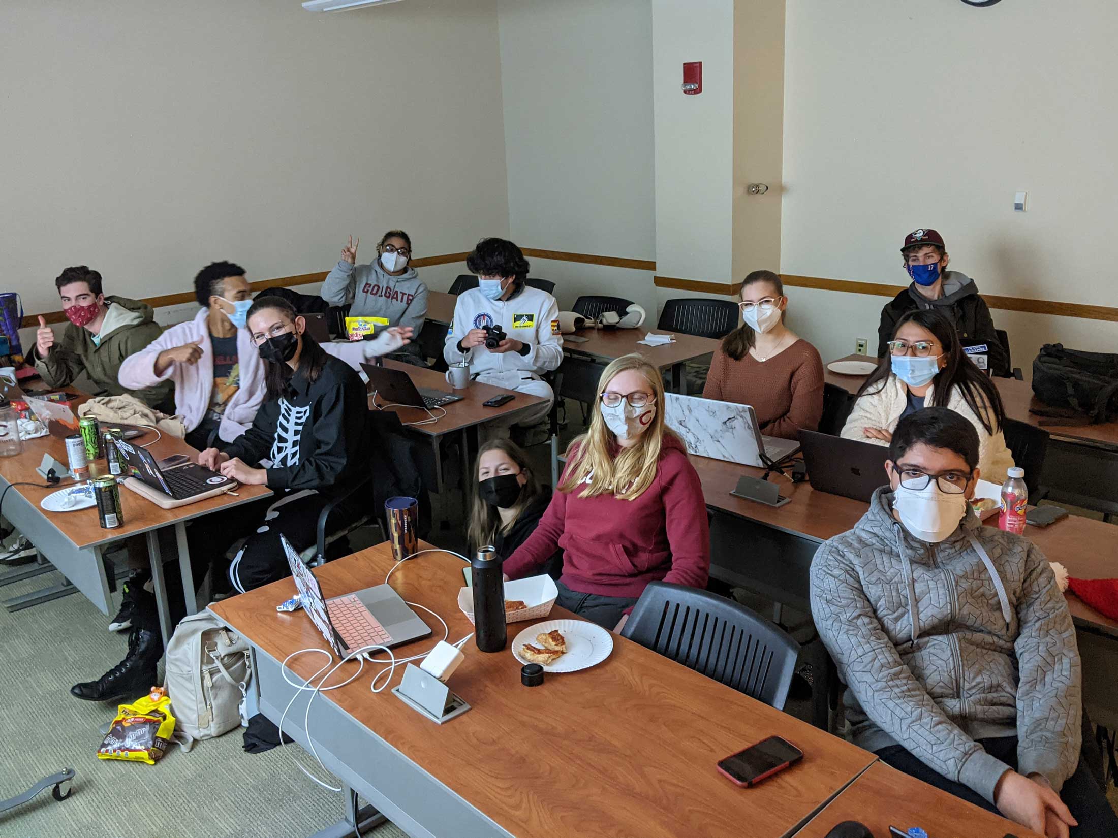 Astronomy students at desks with laptops