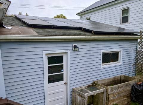 Photo of solar panels on John Pumilio's roof.