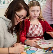 Colgate student works with child student