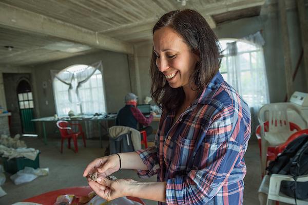 Kristin De Lucia, Assistant Professor of Anthropology, holds aztec artifacts that were found on an archaeological site in the village of San Miguel Xaltocan, Mexico, Jun 22, 2017