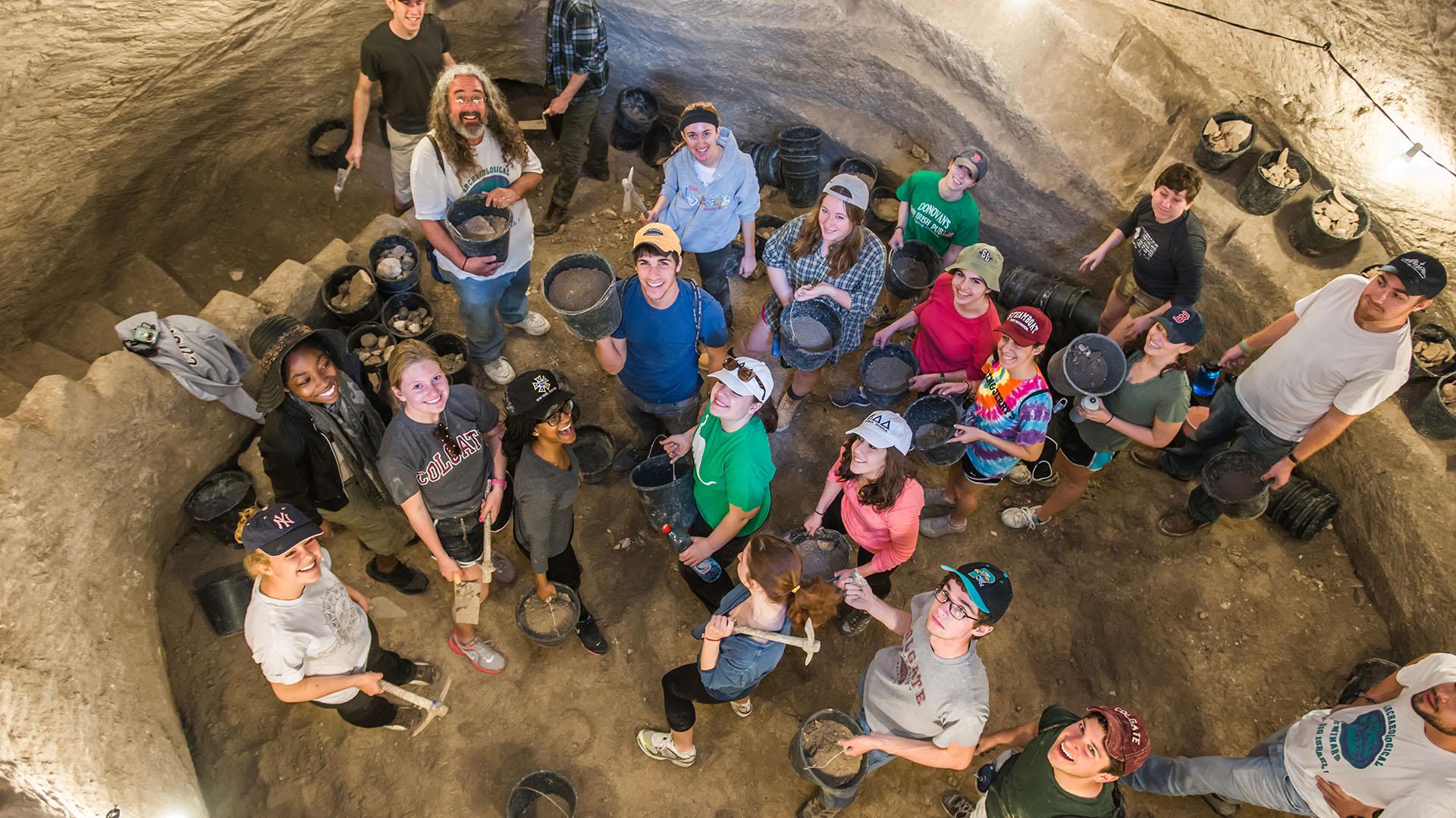 Students on an extended study to Israel dig for ancient artifacts from the historic site Beit Guvrin