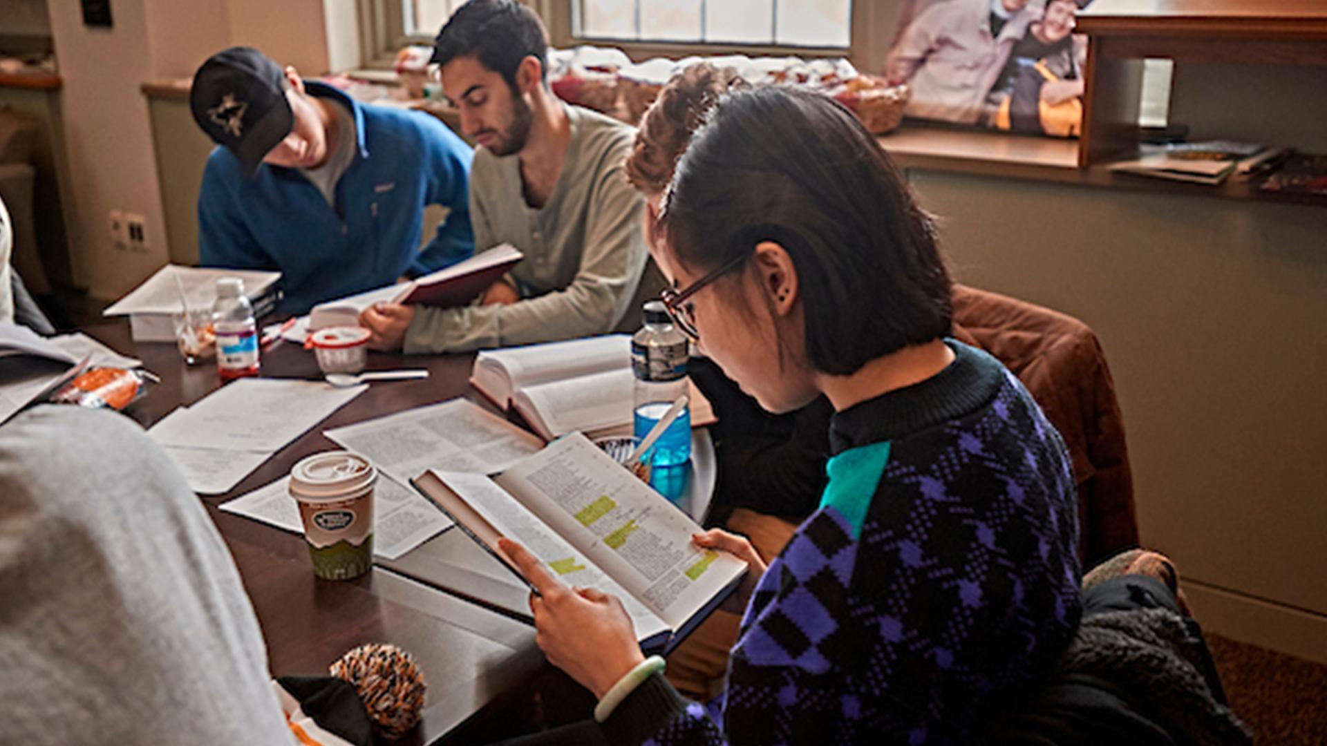  English department students and professors gather for a marathon table reading of Milton's epic poem “Paradise Lost”