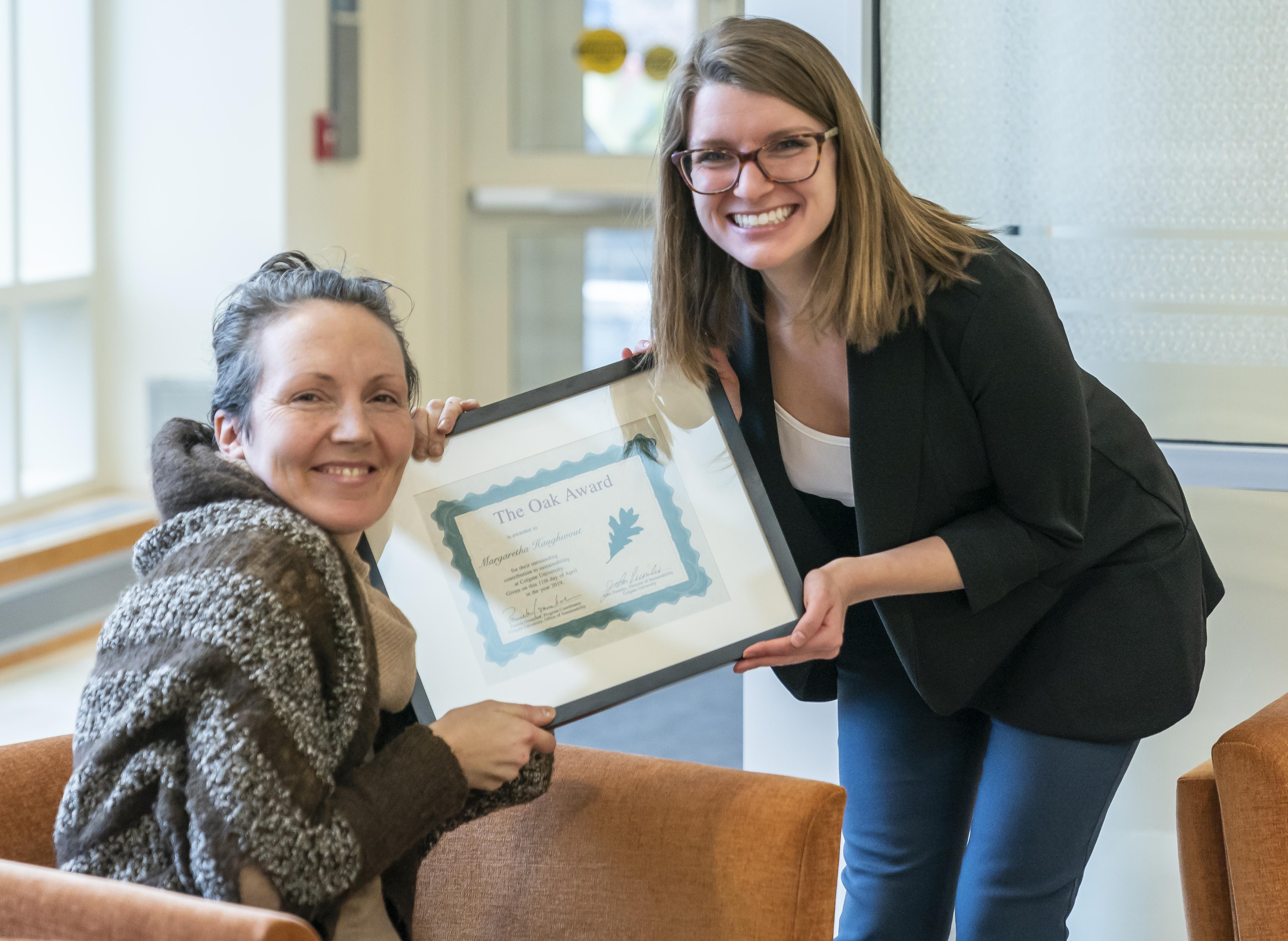 Pamela Gramlich presents an award to Professor Margaretha Haughwout at the Green Summit