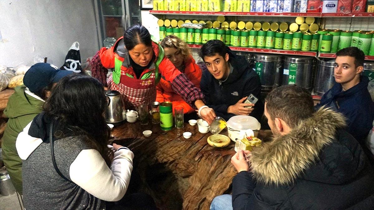 Students share a meal on the study group