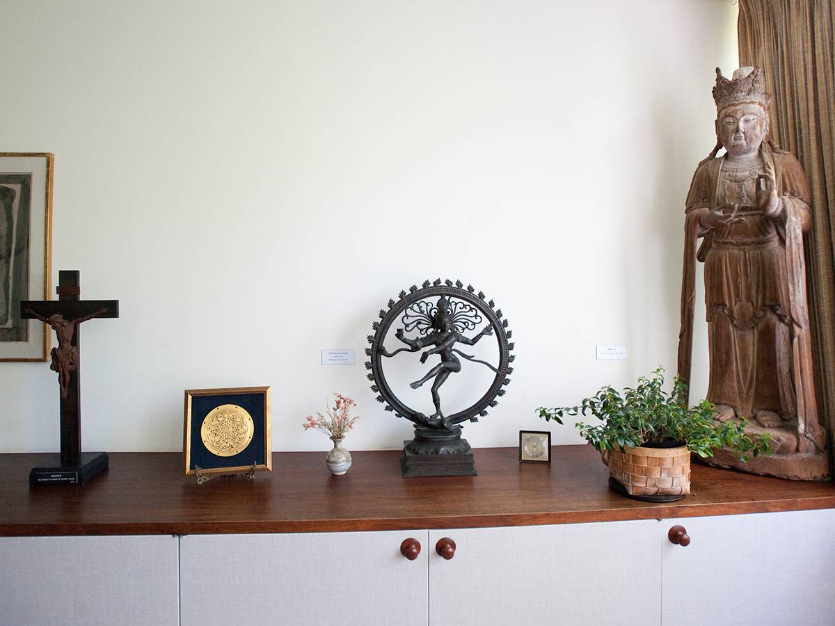 various multi-denominational religious artifacts on a table