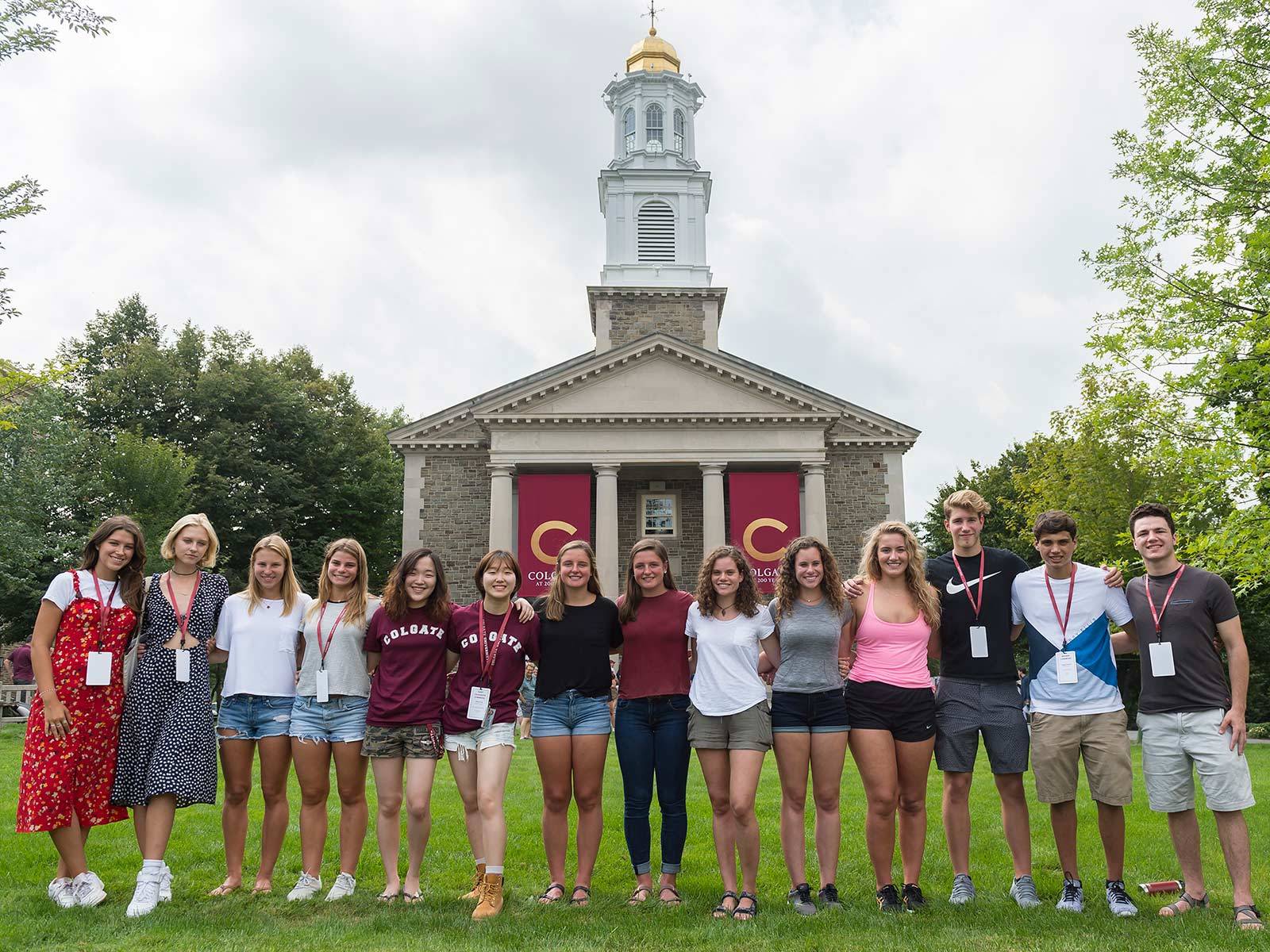 First-year students take a group photo together in front of Colgate Memorial Chapel