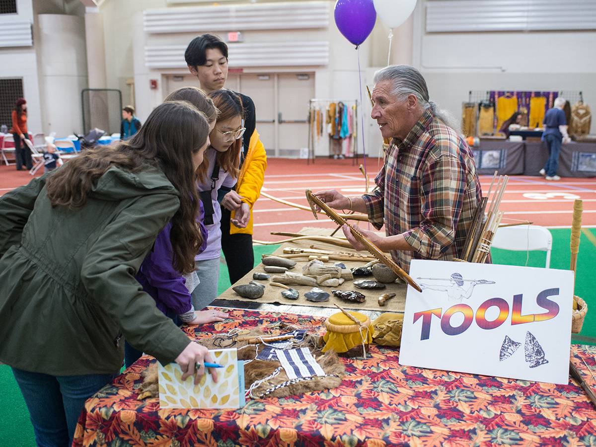 Students attend a Native American festival