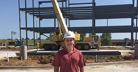 Robert Magel ’18 wearing a white hard hat