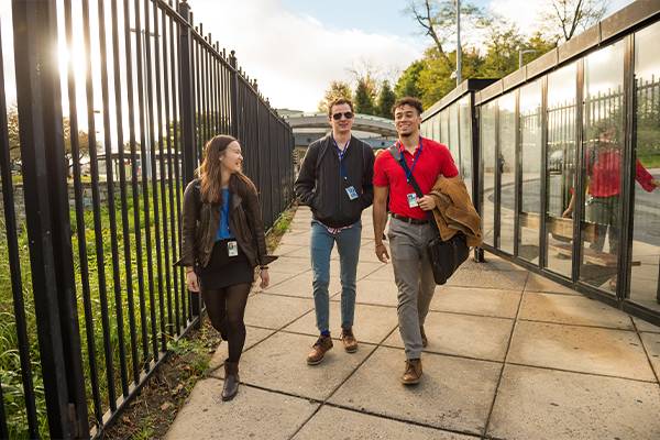 From left, Colgate students Nicole Lue '18, A.J. Ward '18, and Christopher Higham '18, enter the National Institute of Health in Washington D.C., Oct. 24, 2016