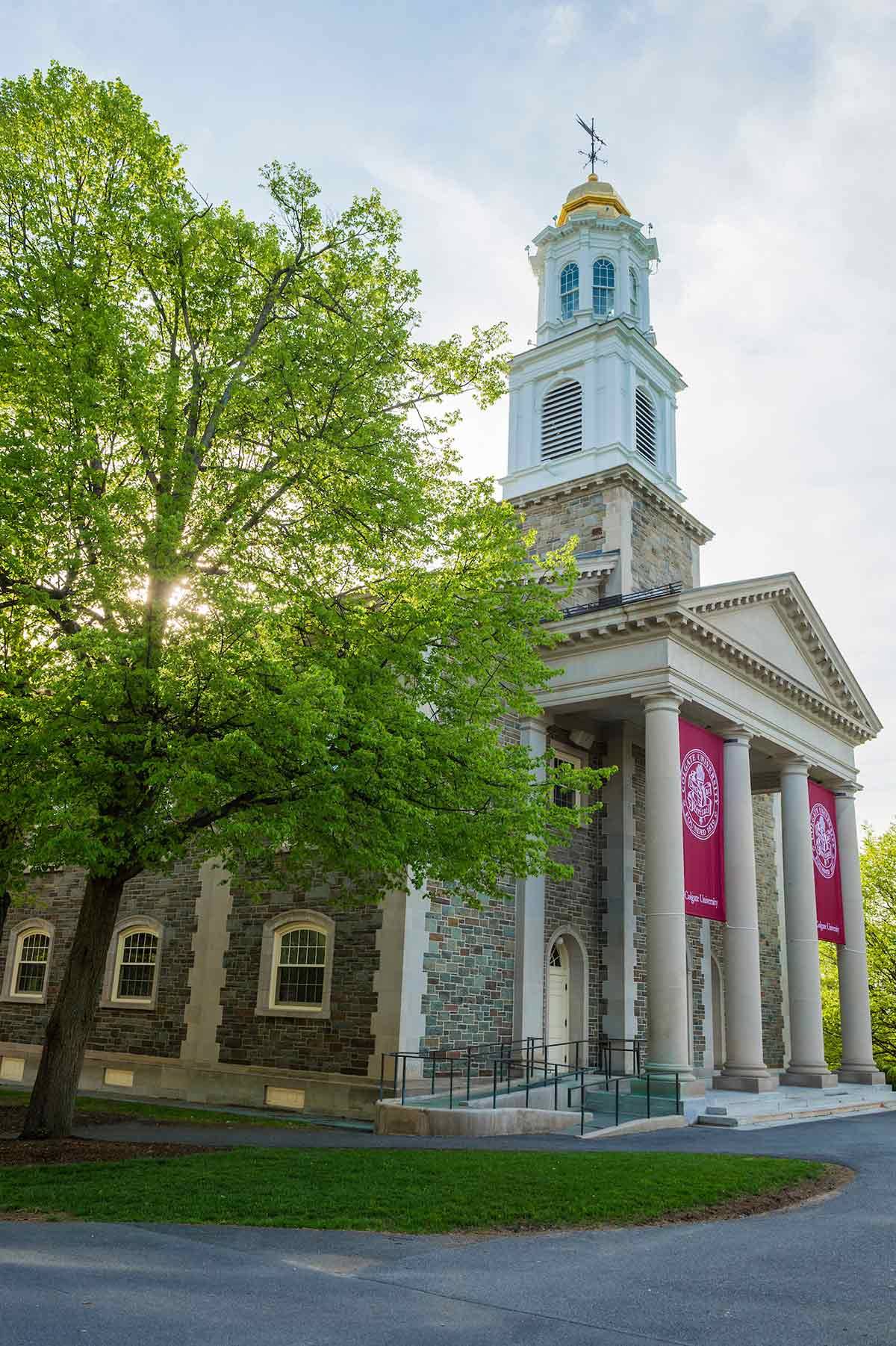 Alumni Memorial Chapel with Bicentennial banners in spring.