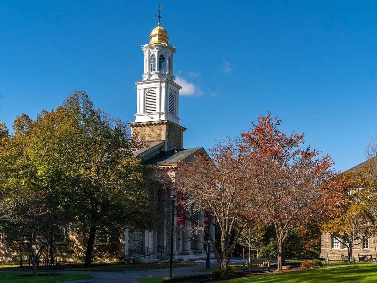 A view of Memorial Chapel on the Academic Quad during early autumn