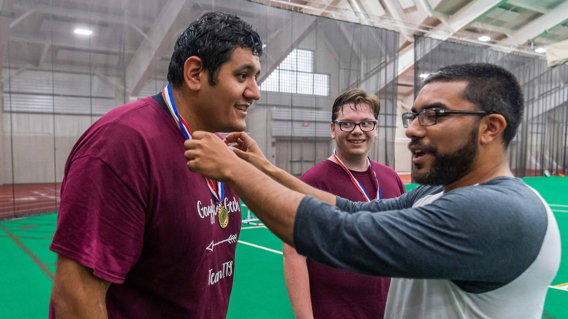 Ahmad Khazaee receives a gold medal 