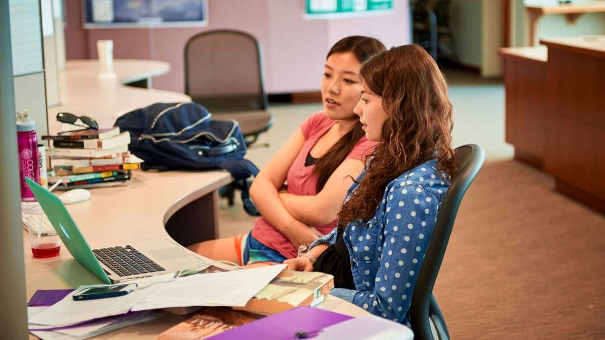 Students collaborate at a work station in Case-Geyer Library