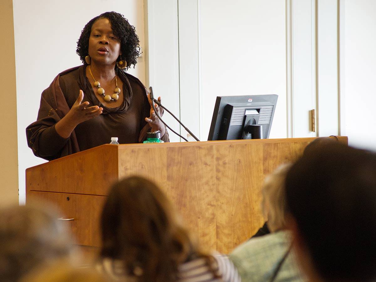 Professor giving lecture from podium