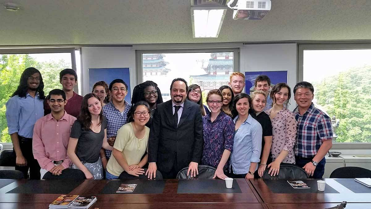 John Palmer and he Benton Scholars take a group photo while traveling in Korea