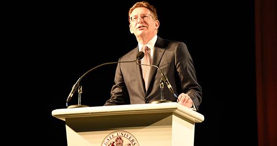 President Jeffrey Herbst speaks from a podium