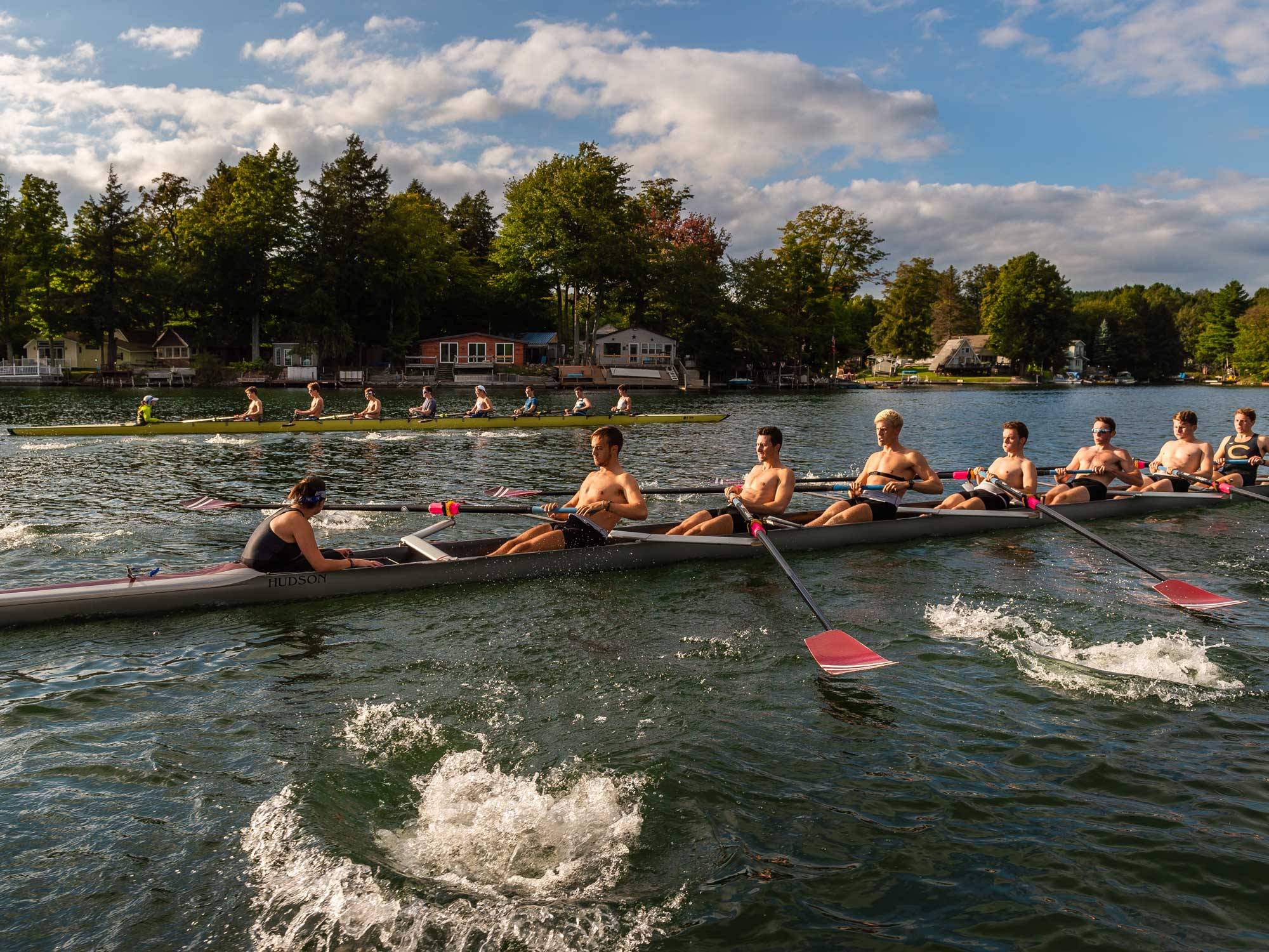 crew team in boat on the water