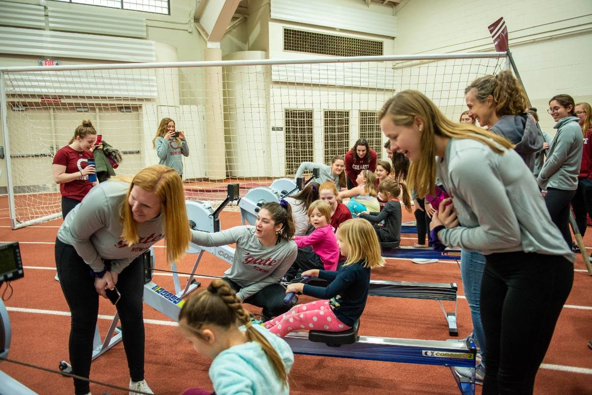 Colgate Women's rowing team and local kids