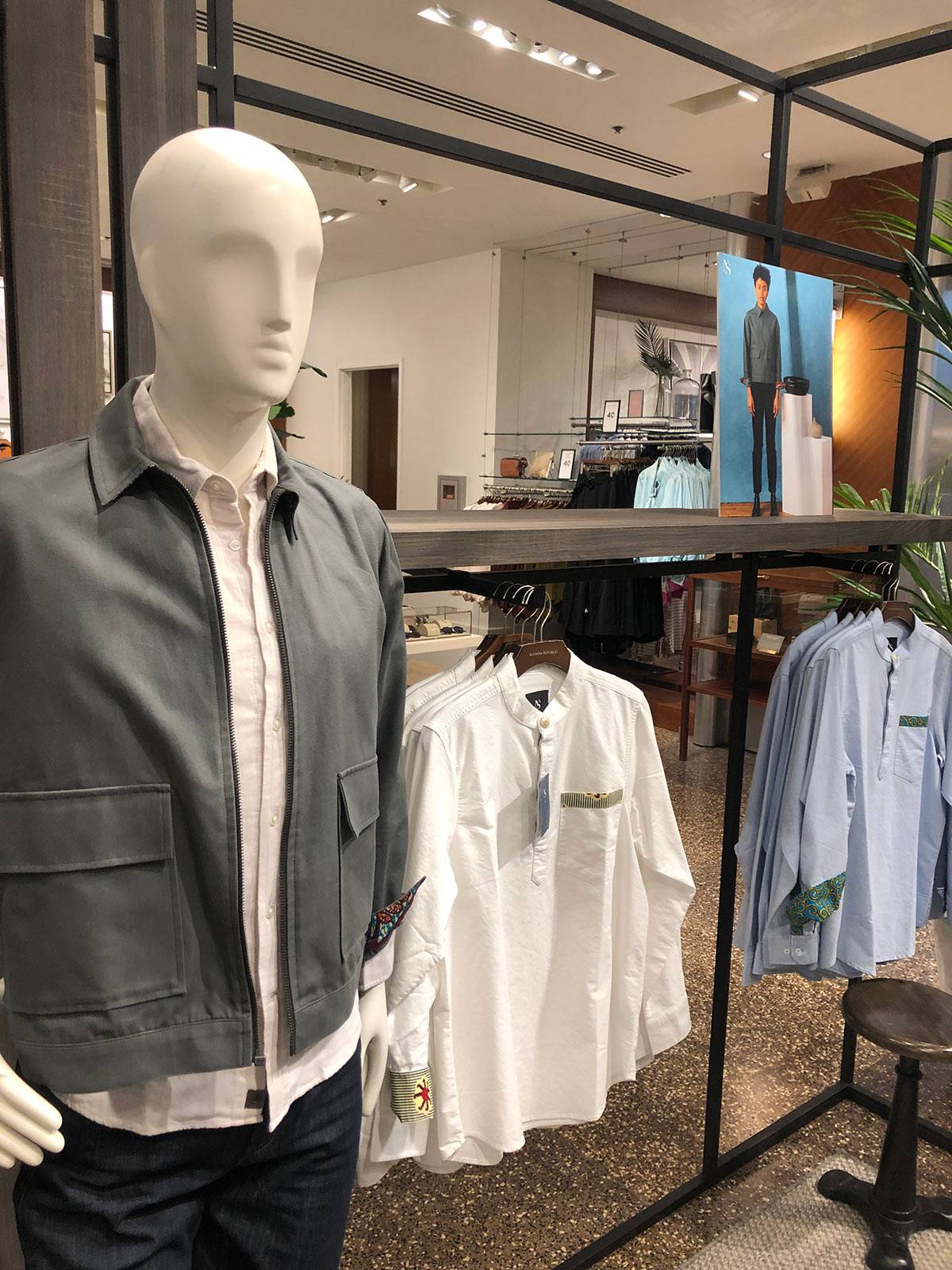 Mannequin wearing a jacket at a clothing store