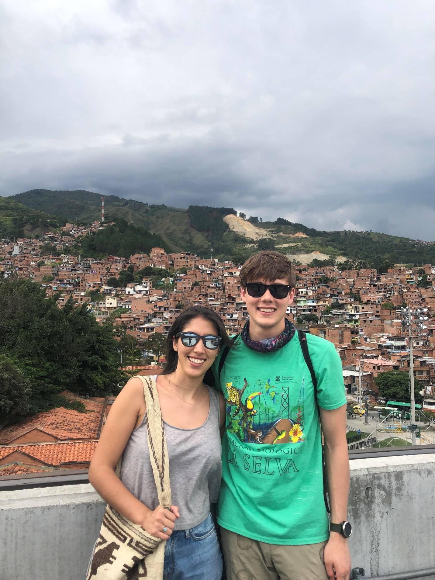 Susana Vega and I exploring Medellín. All houses had beautiful red clay roofs.