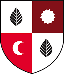Shield with leaves, sun and moon
