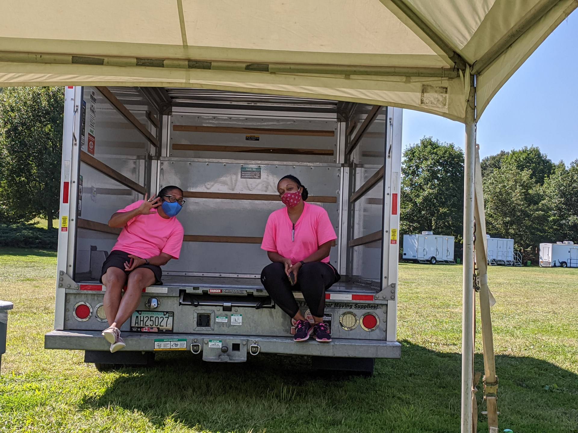 Laura Jack and Hanna Rodriguez-Farrar help unload student belongings