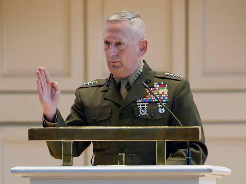 General Mattis speaks from a podium in Colgate Memorial Chapel