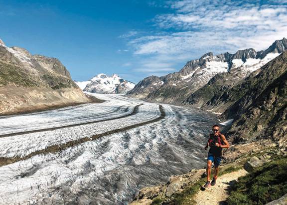 Runner in snowy valley