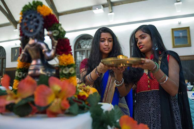 Students in celebratory attire at a Diwali celebration