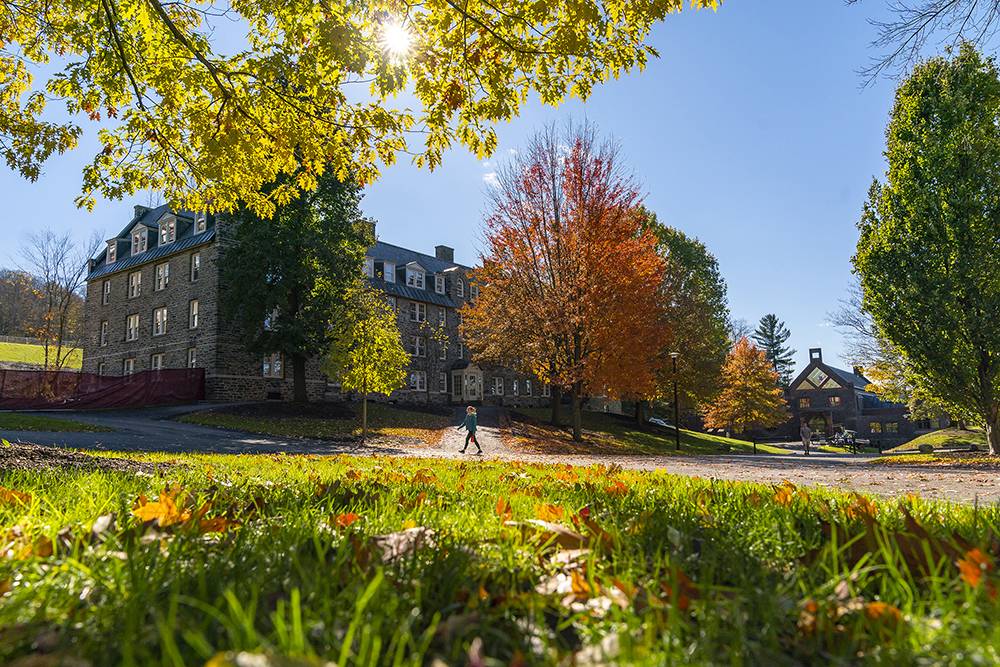 Andrews Hall on a sunny day amidst fall foliage