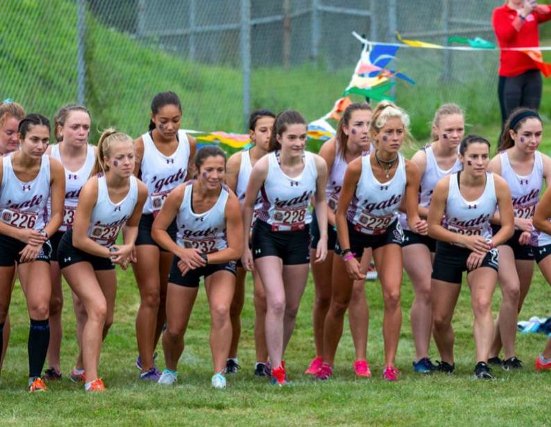 The cross country team starting a race.