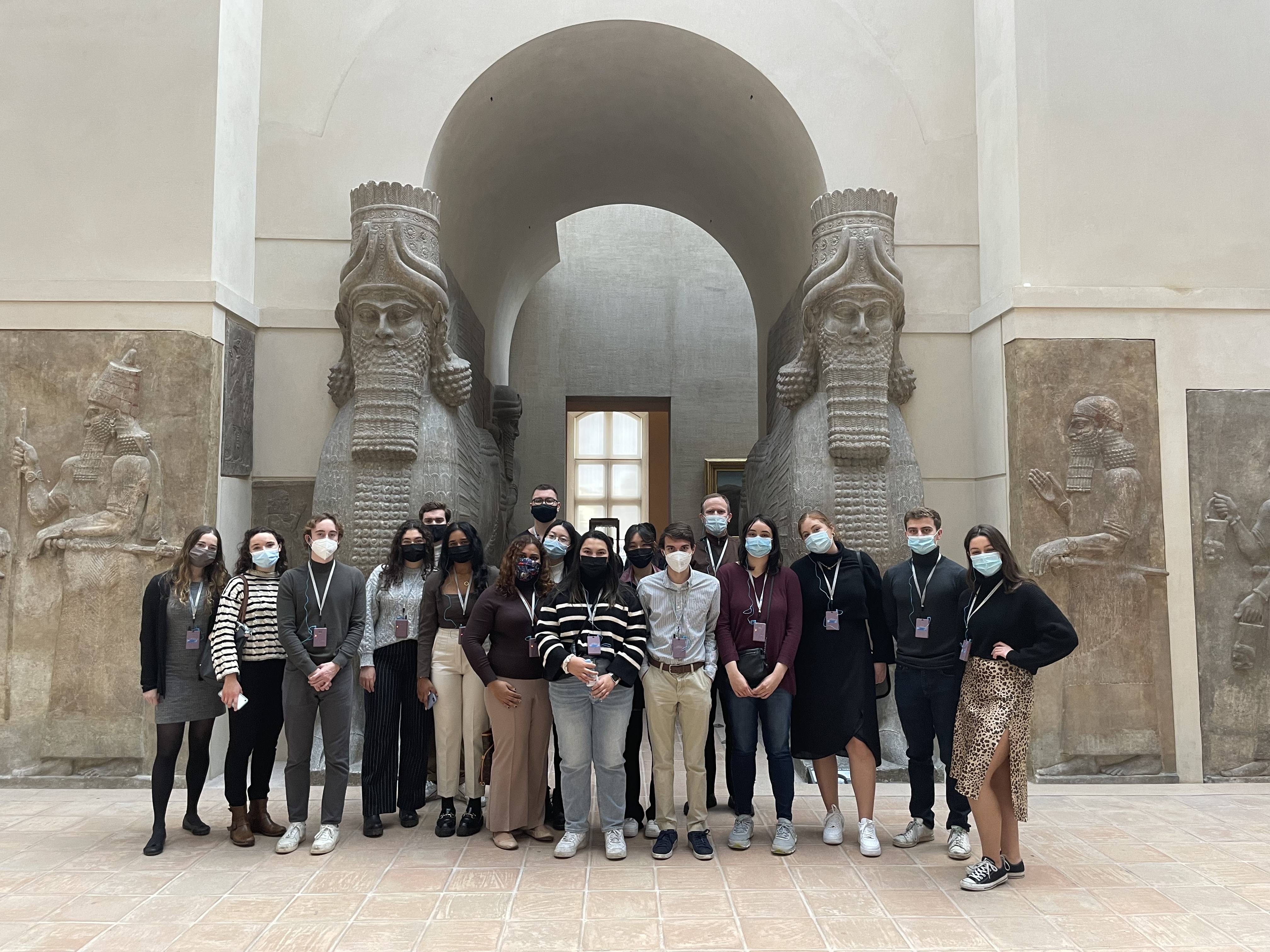 Students in front of the Assyrian Temple at the Louvre