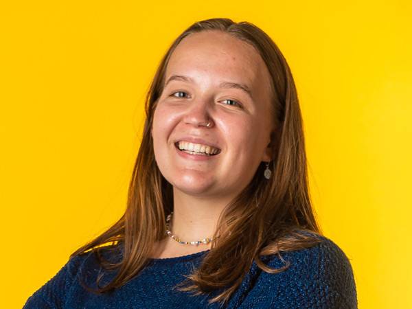 A portrait of Emily Corson.