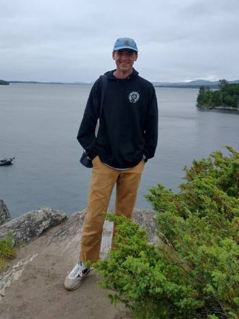 Eric Barber in front of a lake in the Adirondacks