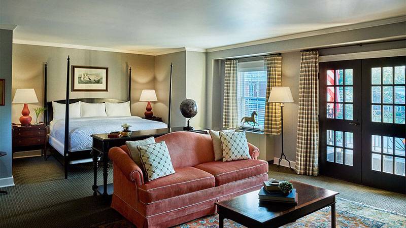 Room at the Colgate Inn with a bed and sofa