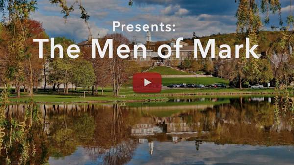 A view of campus with film title "Men of Mark"