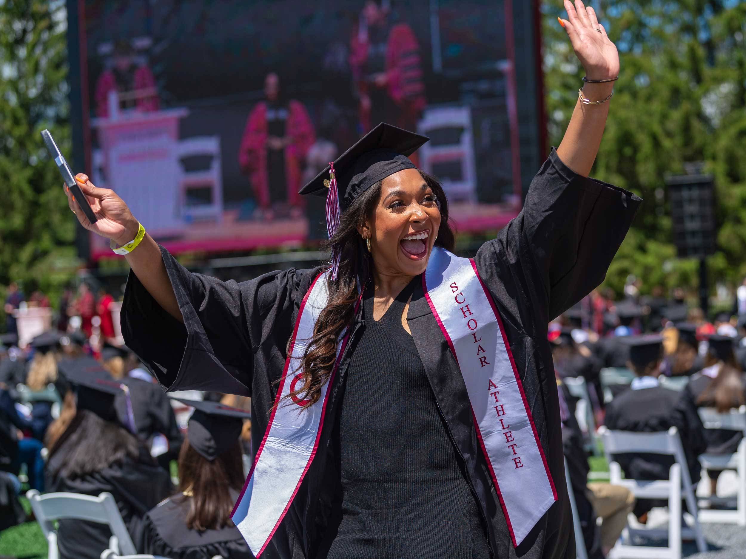 Graduate in the Class of 2020 celebrates 