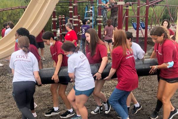 Volunteers help build a playground at Sherburne-Earlville Elementary