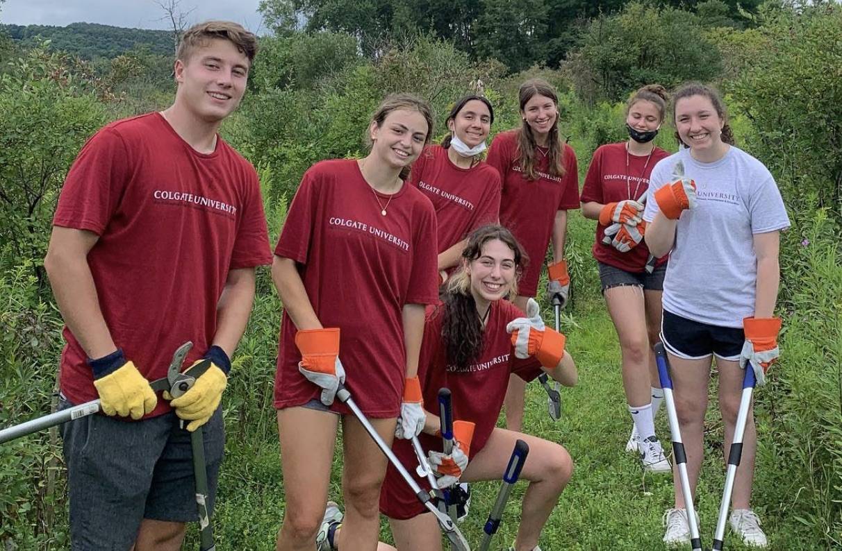 The COVE Outreach program working on a playground at S-E and clearing trails at the Chenango Canal