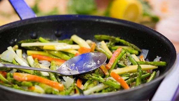 Vegetables cooking in skillet